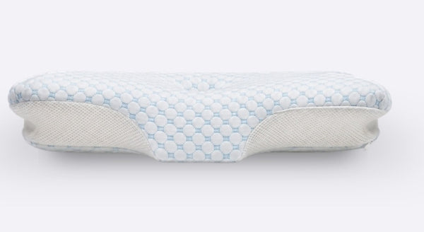 The Serenium Relief Pillow, showing its contoured surface and shoulder recess
