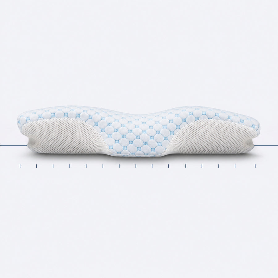 The Serenium Relief Pillow in profile, with an alignment line drawn across it at neck height